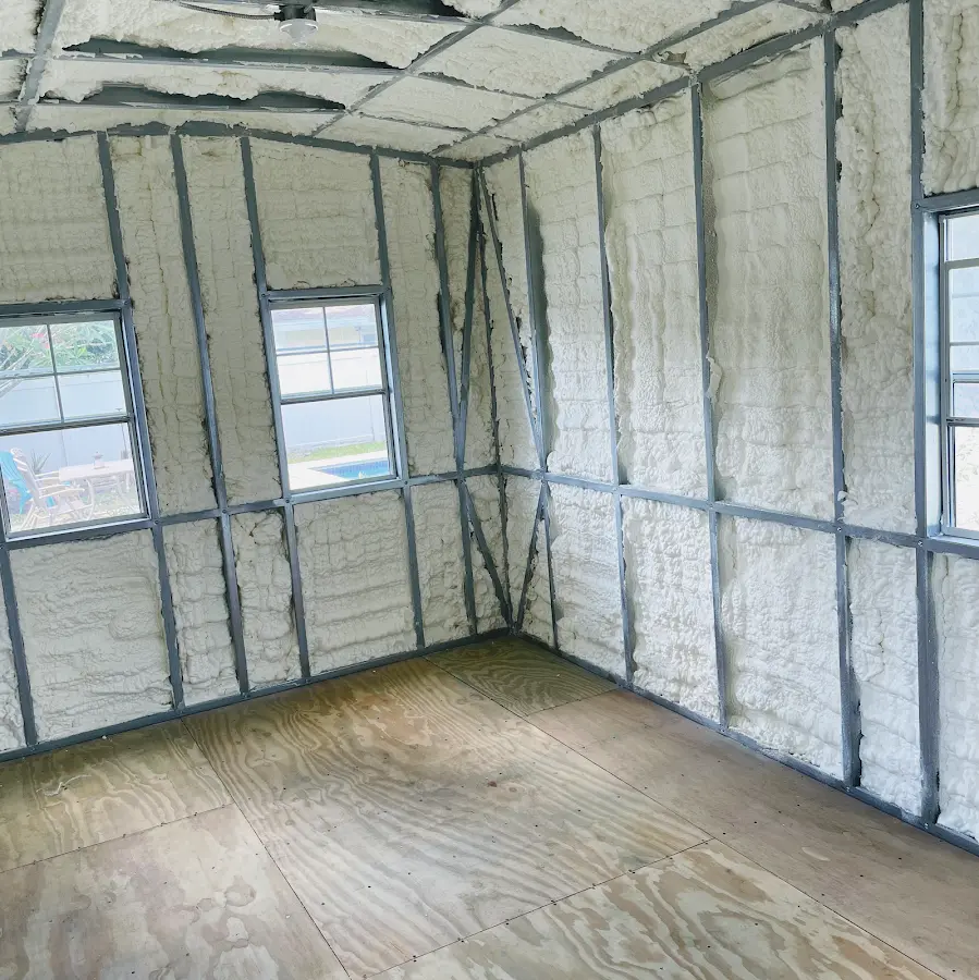 Closed-cell spray foam insulation applied to wall cavities in a residential project in Sand Lake